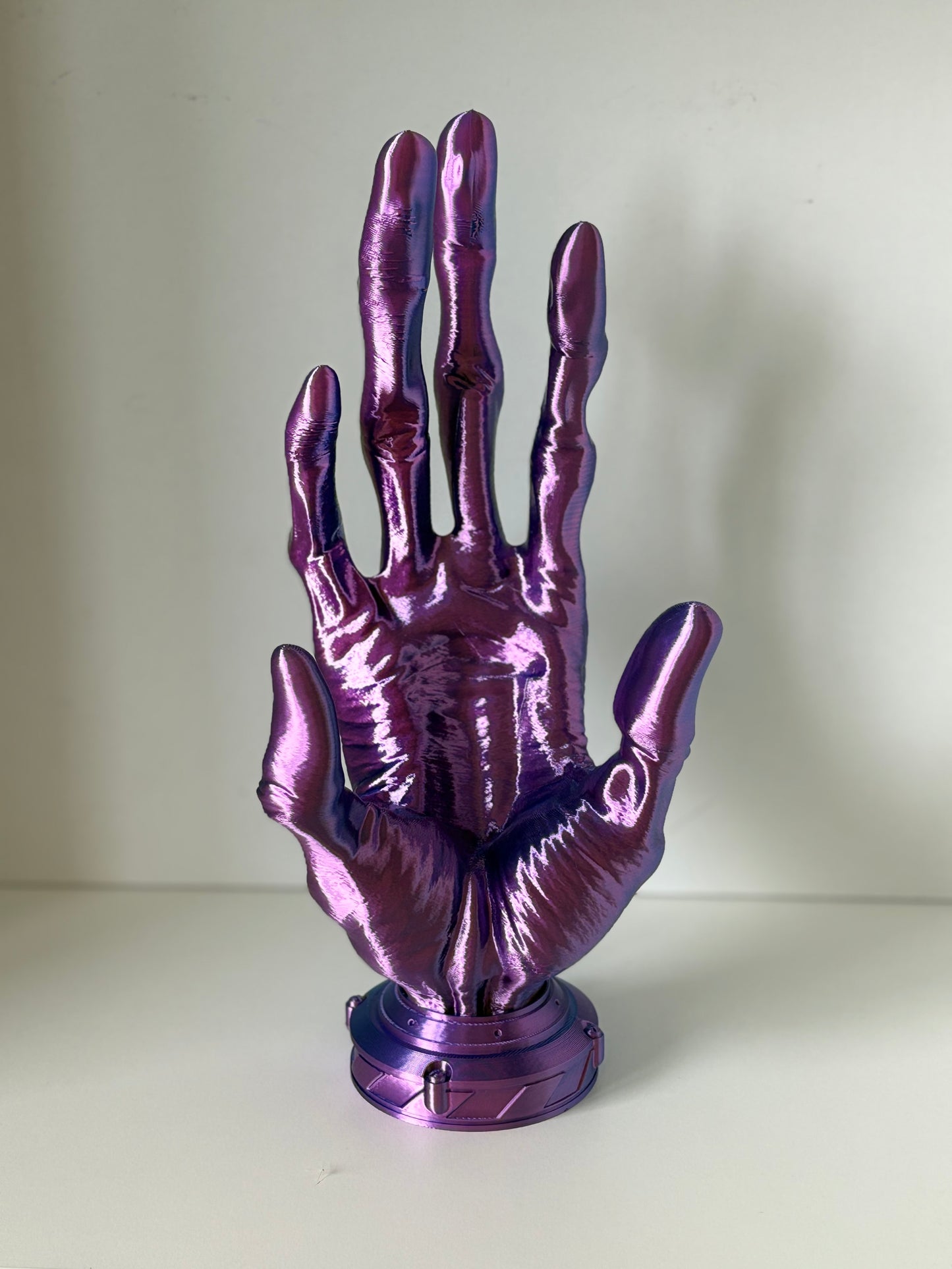 Porte manettes main alien